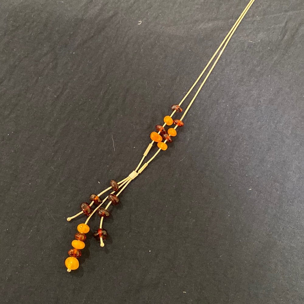 Silver necklace with amber beads